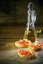 Preparing bruschetta in a country kitchen Royalty Free Stock Photo