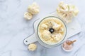 Preparing cauliflower rice in a food processor, cauliflower in a blender