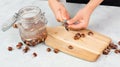 Preparing chestnut liquid soap, cutting buckeye and putting it into a jar with water, alternative homemade detergent for washing