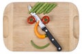 Preparing and cooking food with knife smiling vegetables face on Royalty Free Stock Photo