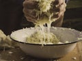 Preparing crunchy, tangy homemade sauerkraut