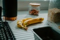 Preparing for a delicious treat: Banana bread setup in a well-lit kitchen Royalty Free Stock Photo