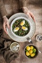 Preparing Dinner with Sauteed Agretti with Taggiasca olives, pinoli or pine nut, Royalty Free Stock Photo