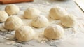 Preparing dough for donuts on the table, close-up. Preparation for making donuts. National Donut Day Royalty Free Stock Photo
