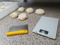 Preparing the dough for pizza, scales Royalty Free Stock Photo