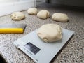 Preparing the dough for pizza, scales Royalty Free Stock Photo