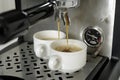 Preparing expressos with a expresso machine Royalty Free Stock Photo