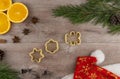 Preparing festive treats for Christmas and new year holidays. cookie molds and flour. orange and star anise