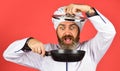 Preparing food in kitchen. Cooking food concept. High quality frying pan. Bearded cook uniform Man hold cooking pan Royalty Free Stock Photo