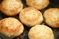 Preparing fried fish cakes on pan Royalty Free Stock Photo