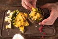 Preparing of fruit salad in coconut shell Royalty Free Stock Photo