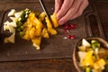 Preparing of fruit salad in coconut shell Royalty Free Stock Photo