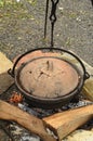 Preparing the goulash in a cettle with clay cover Royalty Free Stock Photo