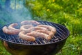 Preparing Grilled Sausages Outdoors Royalty Free Stock Photo