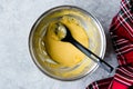 Preparing Hollandaise Sauce in Pot / French Cooking Recipe Royalty Free Stock Photo