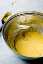 Preparing Hollandaise Sauce in Pot / French Cooking Recipe Royalty Free Stock Photo