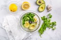 Preparing homemade avocado dressing or dip in food processor Royalty Free Stock Photo