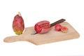 Preparing Indian aka Barbary figs, Opuntia ficus-indica. Cutting board and knife isolated on white. Aka Prickly pear