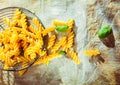 Preparing an Italian fusilli pasta dish