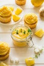 Preparing lemon cupcakes with citrus curd Royalty Free Stock Photo