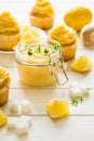 Preparing lemon cupcakes with citrus curd Royalty Free Stock Photo