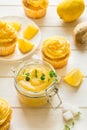Preparing lemon cupcakes with citrus curd Royalty Free Stock Photo