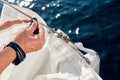 Preparing before lifting staysail sails. Royalty Free Stock Photo