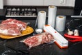 Preparing meat for storage with vacuum sealing techniques Royalty Free Stock Photo