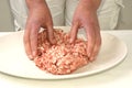 Preparing mince to make meatballs