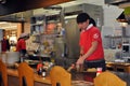 Preparing okonomiyaki