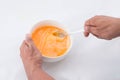 Preparing omelet .Cooking of eggs in White Ceramic Bowl. Royalty Free Stock Photo