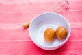 Preparing omelet with eegs and whisk Royalty Free Stock Photo