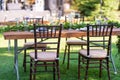 Preparing for an open-air party. Decorated with fresh flowers served tables. Table number. Decoration Details Royalty Free Stock Photo