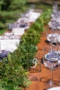 Preparing for an open-air party. Decorated with fresh flowers served tables. Table number. Decoration Details Royalty Free Stock Photo