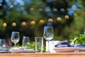 Preparing for an open-air party. Decorated served tables await guests. Decoration Details Royalty Free Stock Photo