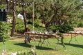 Preparing for an open-air party. Decorated served tables await guests. Decoration Details