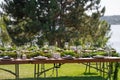 Preparing for an open-air party. Decorated served tables await guests. Decoration Details Royalty Free Stock Photo