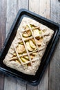 Preparing open pie or galette with apples Royalty Free Stock Photo