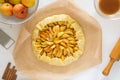 Preparing open pie or galette with apples Royalty Free Stock Photo