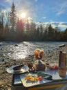 Preparing for the picnic near a river