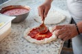 Preparing Pizza dought at the pizzeria. Royalty Free Stock Photo