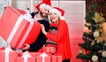 Preparing presents for christmas. New year gift. Gift from Santa Claus. Man and woman with gift boxes. Guy with big gift Royalty Free Stock Photo