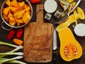 Preparing pumpkin, onions and sweet peppers for cooking Royalty Free Stock Photo