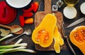 Preparing pumpkin, onions and sweet peppers for cooking Royalty Free Stock Photo