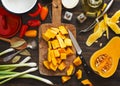 Preparing pumpkin, onions and sweet peppers for cooking Royalty Free Stock Photo