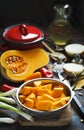 Preparing pumpkin, onions and sweet peppers for cooking Royalty Free Stock Photo