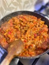 preparing sauce in a pan, vegetable sauce with eggplant and tomatoes Royalty Free Stock Photo
