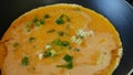 Preparing Scrambled Eggs Mixed with Cornflour and Seasoned with Spring Onion