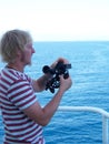 Working with sextant on board of merchant vessel