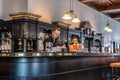 Preparing Singapore Sling Cocktails at historic Raffles Hotel Bar in Singapore